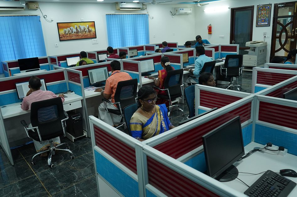 Medlar's production floor with staff working at computer workstations
